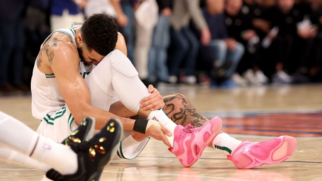 Tatum carried off in Celtics' Game 4 loss; MRI next
